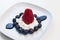 Dessert with strawberry and blueberries