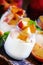 Dessert with sweet peaches, cottage cheese and whipped cream, se