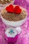 Dessert tiramisu cheese dessert in bowls with ring for proposal of marriage