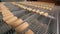 Desserts on conveyor belt at chocolate factory.