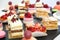 Desserts with fruits, mousse, biscuits