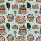 Desserts seamless pattern on a blue background. Hand drawn vector