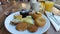 Desserts on a white plate. Oriental cookies. Ananas slices. Close-up.