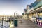 DESTIN, FLORIDA - FEBRUARY 2016: Destin Harbor Boardwalk at sunset with shops and ocean