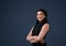 Destined for success. Cropped portrait of an attractive young businesswoman standing against a gray background alone