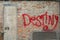 Destiny graffiti on brick wall