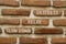 Destress relax slow down symbol. Concept words Slow down Relax Destress on brick wall. Beautiful brick wall background.