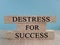 Destress for success symbol. Concept black words Destress for success on brick blocks.