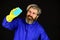 Destroy microorganisms. Disinfection concept. Bearded cleaner in blue uniform. Spring cleaning. Hipster clean house