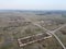 Destroyed agricultural buildings, aerial view. Abandoned livestock farm