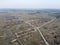 Destroyed agricultural buildings, aerial view. Abandoned livestock farm