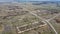 Destroyed agricultural buildings, aerial view. Abandoned livestock farm