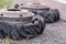 Destroyed blown tire with crushed and damaged rubber on a truck.