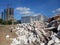 Destroyed building, earthquake, pile of rubble and debris, landfill