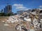 Destroyed building, earthquake, pile of rubble and debris, landfill