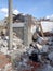 Destroyed building, earthquake, pile of rubble and debris, landfill