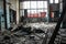 Destroyed factory in late autumn, empty and dirty production shop.