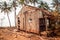 destroyed home at coast , wooden hut ruin / destroyed house