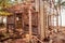 Destroyed home at coast , wooden hut ruin / destroyed house made of wood