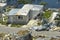 Destroyed by hurricane Ian suburban house in Florida mobile home residential area. Consequences of natural disaster