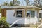 Destroyed by hurricane Ian suburban house in Florida mobile home residential area. Consequences of natural disaster