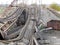 Destroyed railway bridge, broken freight railcars, at the beginning of the military conflict in the Donbas