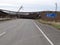 Destroyed railway bridge, broken freight railcars, at the beginning of the military conflict in the Donbas. Blocked road to