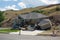 Destruction of a new home in a landslide after heavy rains