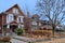 Detached brick houses with gables