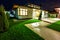 Detached house at night - view from outside the rear courtyard.