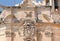 Detail of 18th century buildings with reliefs and sculptures in historical Valletta city, Malta