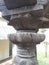 Detail of ancient ruined flower model stone pillar