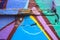 Detail of an anonymous street graffiti with many colors, cheerful urban background