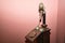 Detail of an antique candlestick telephone on a magenta background. Concept antiques, candlestick phones, calls, communications