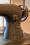 Detail of an antique manual treadle sewing machine