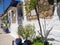 Detail of arabic building with blue door in african medina of Asilah town in Morocco