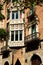 Detail of arabic window with balcony tiled beautiful facade and facade