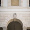 Detail of the arc of the stone porch of an old Italian villa