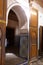 Detail of an arch door entrance in an old landmark in Arabian style in Marrakesh