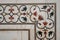 Detail of architectural decoration made of white marble, onyx and other stones on the Taj Mahal in Agra, India