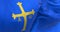 Detail of the Asturias flag waving in the wind