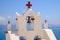 Detail of bell and crosses on traditional cycladic church, Santorini