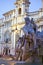 Detail of Bernini fountain and obelisk at sunrise in Rome