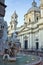 Detail of Bernini fountain and obelisk at sunrise in Rome