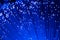 Detail of blue growing bunch of optical fibers background, fast