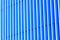 Detail of blue striped metal facade for background