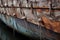 detail of boats wooden hull with planks and nails