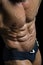 Detail of bodybuilder torso: ripped abs and pecs