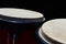 Detail of bongo drums macho and hembra, dark background