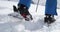 Detail of boot walking up along snow landscape.Mountaineering ski activity. Skier people winter sport in alpine mountain